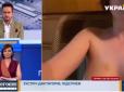 Хіти тижня. Тема була серйозна, але щось пішло не так: Гола жінка вела пряму трансляцію в ефірі телеканалу 